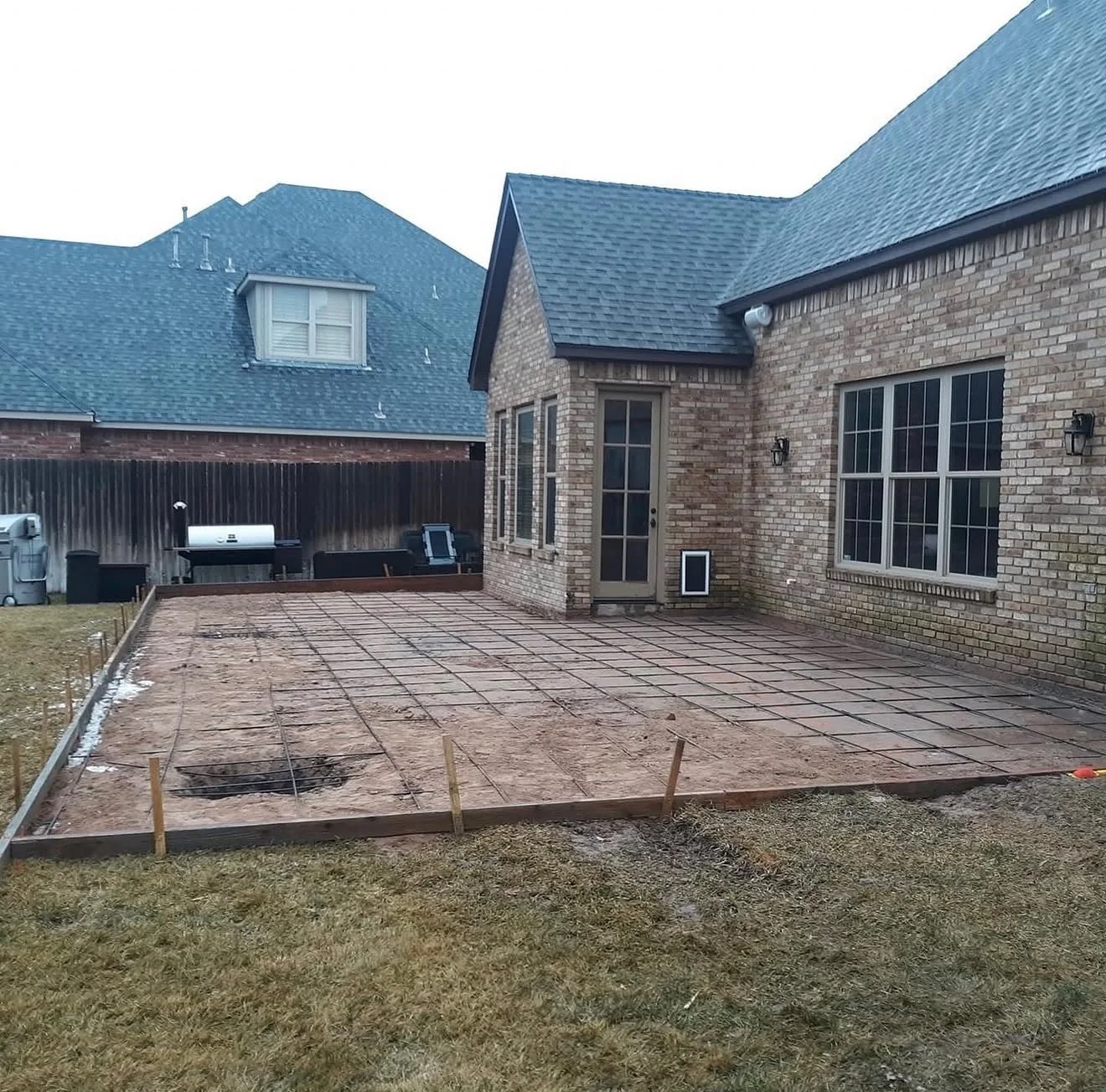 Backyard patio area before All Star Remodeling & Construction work